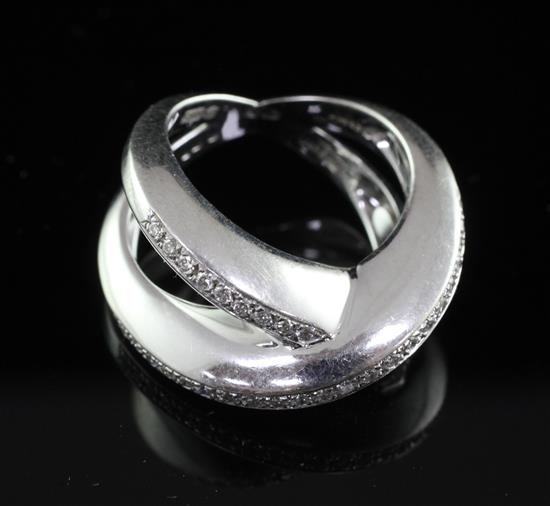 A modern Italian Chimento 18ct white gold and diamond set x-shaped crossover ring, size O.